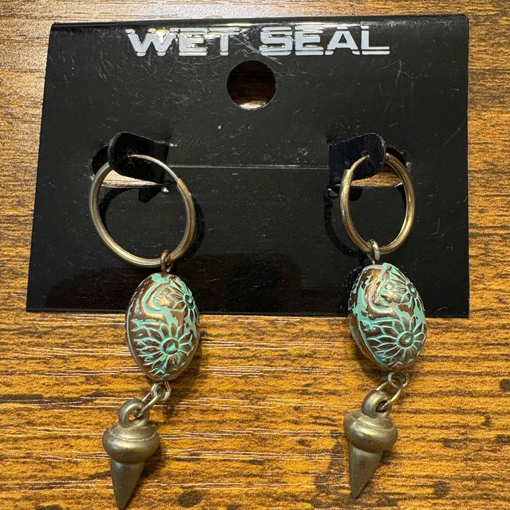 Wet Seal fashion earrings with turquoise colored beads and gold tone spike. New